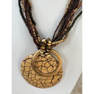 Multistrand Beaded Necklace With Crackled Resin Pendant & Gold-Tone Accents Eart